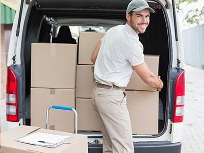 Man Takes Shipping Package From Van | Mail Boxes Etc.