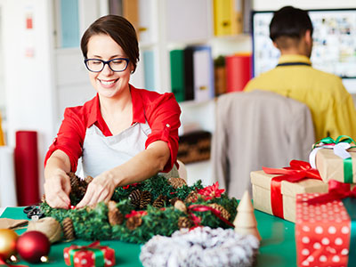 Employee Designs Christmas Wreath and Christmas Packages to Send | Mail Boxes Etc.